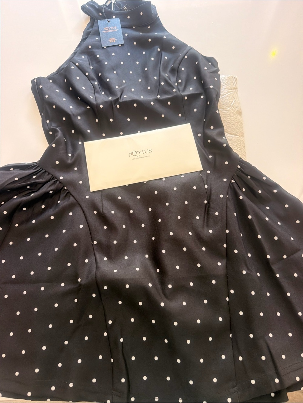 Elegant Polka Dot Halter
Neck Sleeveless Flared